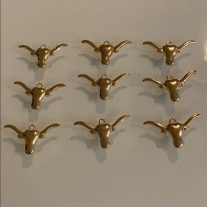 Lot of 9 long horn pendants